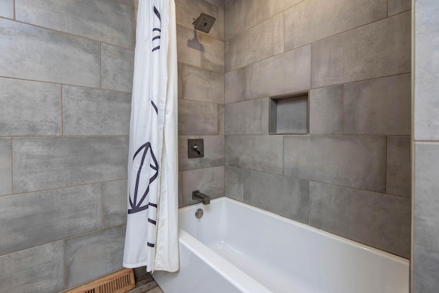 2210 S Catalina Ave, Springfield, MO 65804 - bathroom featuring shower / tub combo