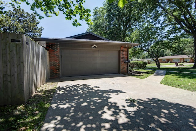 2210 S Catalina Ave, Springfield, MO 65804 - garage with concrete driveway