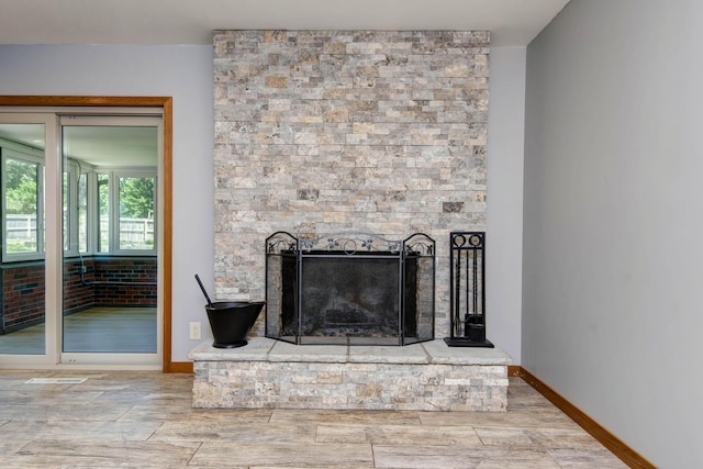 2210 S Catalina Ave, Springfield, MO 65804 - detailed view of wood finished floors and a fireplace