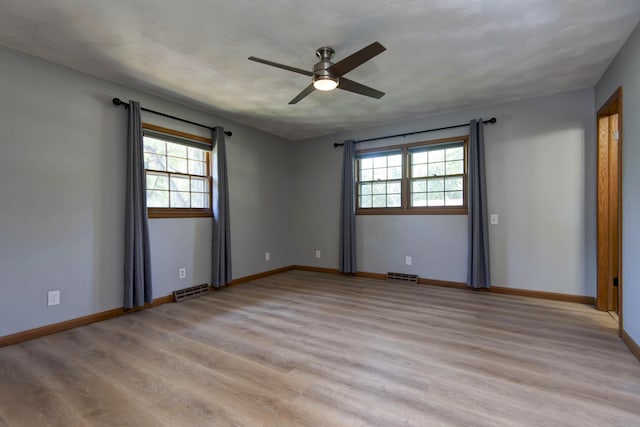 2210 S Catalina Ave, Springfield, MO 65804 - empty room with ceiling fan and light wood finished floors