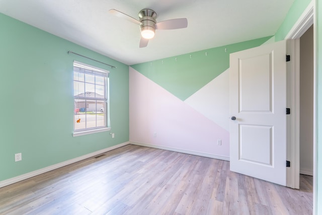 865 E Striper Dr, Nixa, MO 65714 - unfurnished room with a ceiling fan and wood finished floors