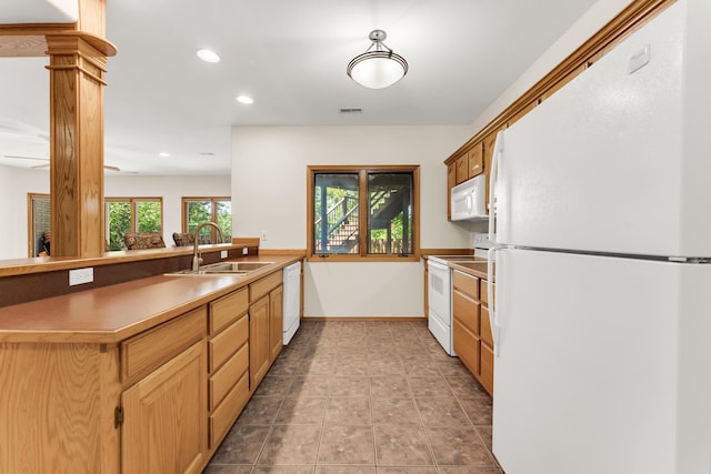 201 Silver Oak Ln, Branson West, MO 65737 - kitchen with white appliances, recessed lighting, and a peninsula