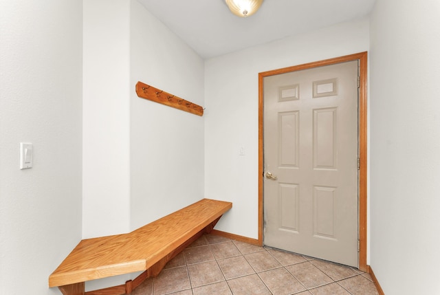 201 Silver Oak Ln, Branson West, MO 65737 - mudroom featuring light tile patterned floors and baseboards