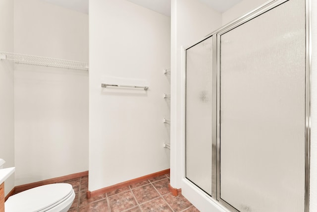 201 Silver Oak Ln, Branson West, MO 65737 - full bath with a shower stall, a spacious closet, vanity, and tile patterned floors