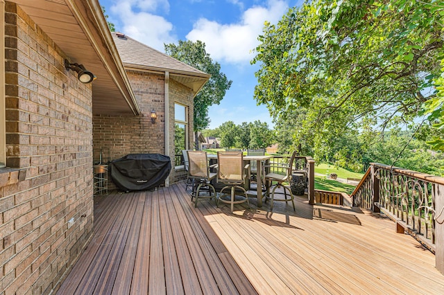 201 Silver Oak Ln, Branson West, MO 65737 - wooden deck with outdoor dining space and grilling area