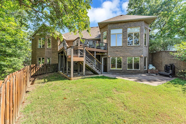 201 Silver Oak Ln, Branson West, MO 65737 - back of house with stairway, a deck, brick siding, a fenced backyard, and a patio area
