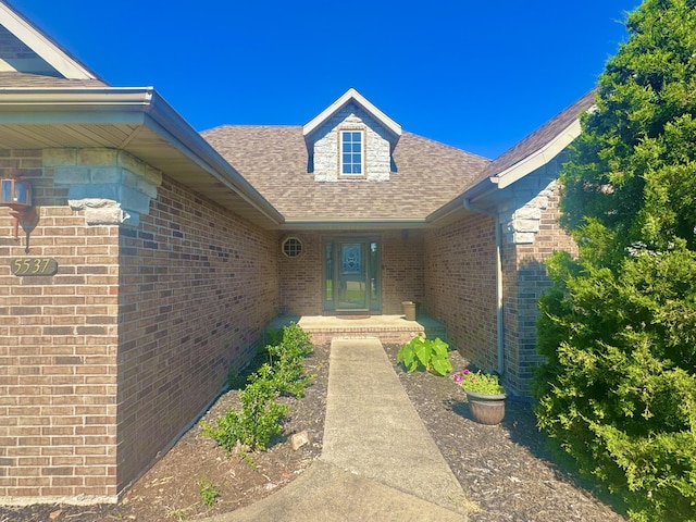 5537 S Pinehurst Ave, Springfield, MO 65810 - entrance to property featuring brick siding and a shingled roof