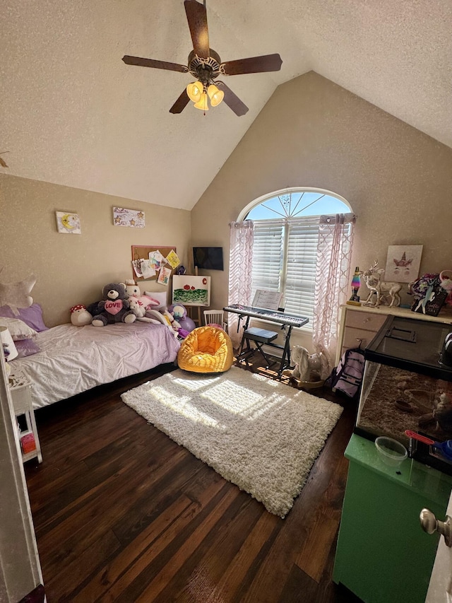 5537 S Pinehurst Ave, Springfield, MO 65810 - bedroom featuring wood finished floors, lofted ceiling, a textured ceiling, and ceiling fan