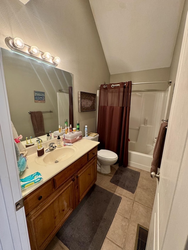 5537 S Pinehurst Ave, Springfield, MO 65810 - full bath with lofted ceiling, vanity, shower / tub combo, and tile patterned floors