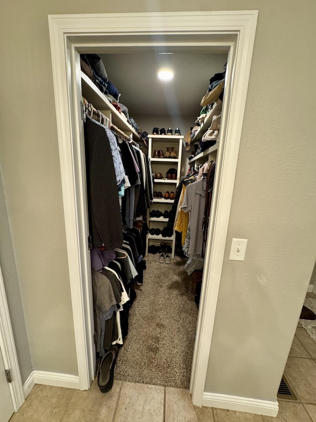 5537 S Pinehurst Ave, Springfield, MO 65810 - walk in closet with tile patterned flooring