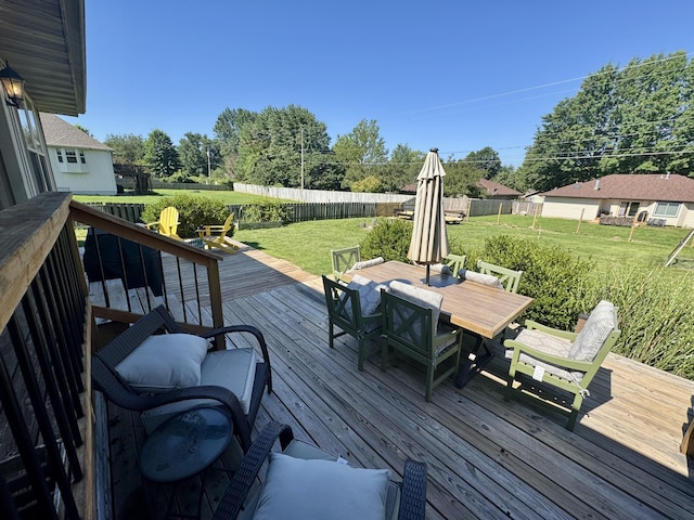 5537 S Pinehurst Ave, Springfield, MO 65810 - deck featuring outdoor dining area and a fenced backyard