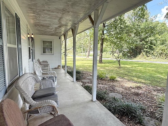 16610 S 1375th Rd, Nevada, MO 64772 - porch with a yard