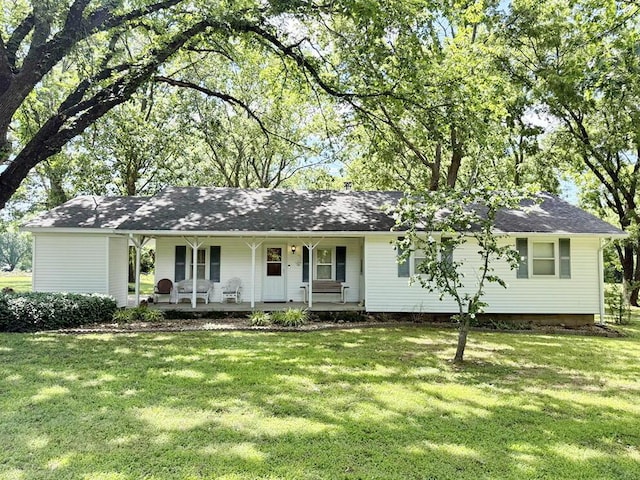16610 S 1375th Rd, Nevada, MO 64772 - single story home featuring a porch and a front lawn