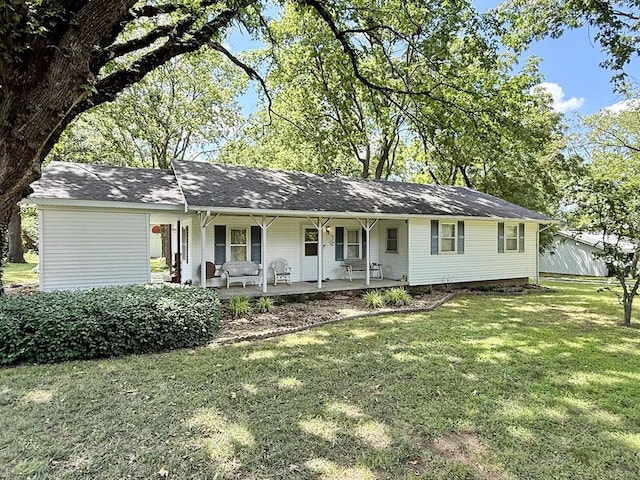 16610 S 1375th Rd, Nevada, MO 64772 - ranch-style home with covered porch and a front lawn