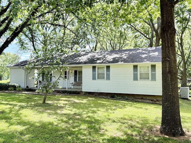 16610 S 1375th Rd, Nevada, MO 64772 - ranch-style house featuring a front lawn and a porch