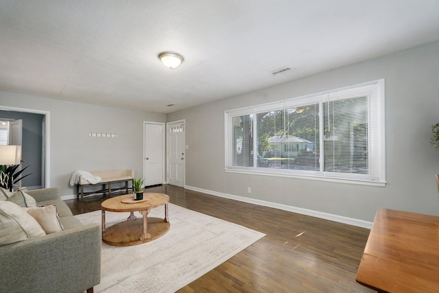 1739 S S Ave, Springfield, MO 65807 - living area with baseboards and wood finished floors