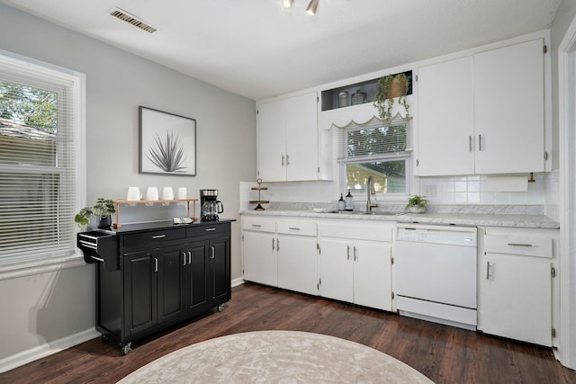 1739 S S Ave, Springfield, MO 65807 - kitchen featuring white dishwasher, white cabinetry, light countertops, and dark wood-style flooring