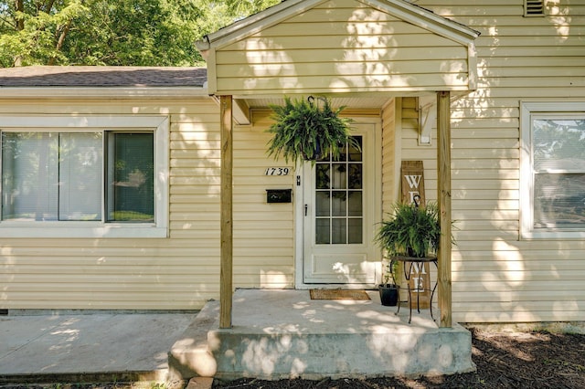 1739 S S Ave, Springfield, MO 65807 - entrance to property with a porch and a shingled roof