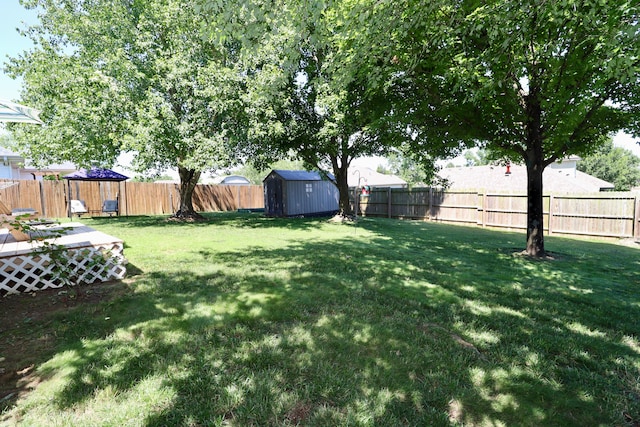 576 S Barnstable, Nixa, MO 65714 - fenced backyard with a storage shed and a deck