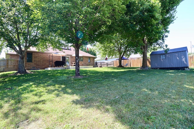 576 S Barnstable, Nixa, MO 65714 - fenced backyard with a storage shed