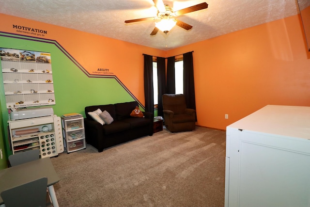 576 S Barnstable, Nixa, MO 65714 - carpeted living room featuring a textured ceiling and a ceiling fan