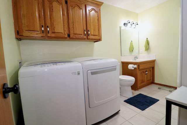 576 S Barnstable, Nixa, MO 65714 - laundry area featuring washer and dryer and light tile patterned floors