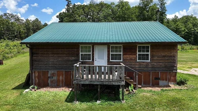2240 Racetrack Hollow Rd, Anderson, MO 64831 - rear view of house featuring a yard and a metal roof