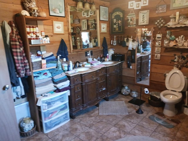 2240 Racetrack Hollow Rd, Anderson, MO 64831 - bathroom featuring tile patterned flooring, wood walls, and vanity