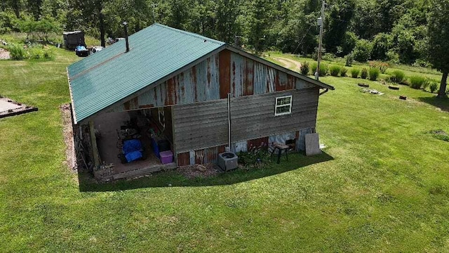 2240 Racetrack Hollow Rd, Anderson, MO 64831 - view of side of home featuring a yard and a metal roof
