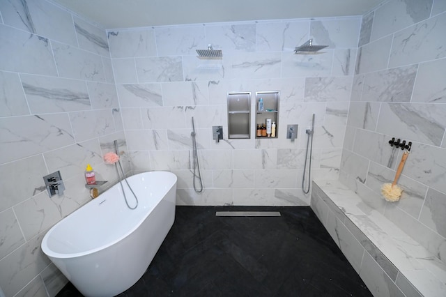30950 E 54th Hwy, El Dorado Springs, MO 64744 - full bathroom with a freestanding tub, a tile shower, and tile walls