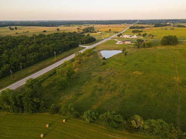 30950 E 54th Hwy, El Dorado Springs, MO 64744 - aerial view at dusk of a rural view and a water view