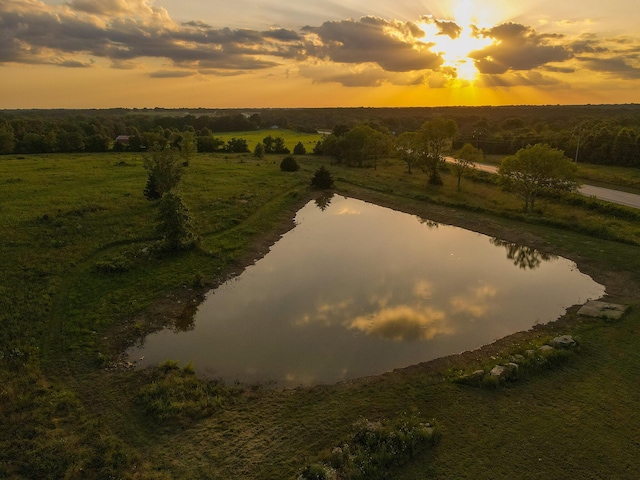 30950 E 54th Hwy, El Dorado Springs, MO 64744 - aerial view at dusk of a water view and a view of rural / pastoral area