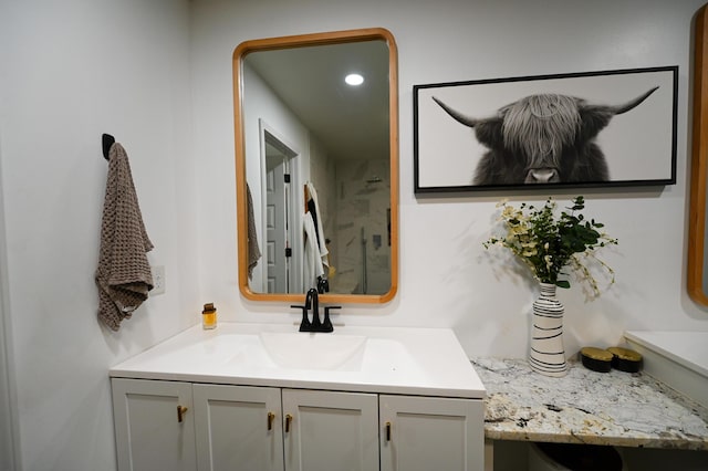 30950 E 54th Hwy, El Dorado Springs, MO 64744 - full bath with vanity, a shower, and recessed lighting