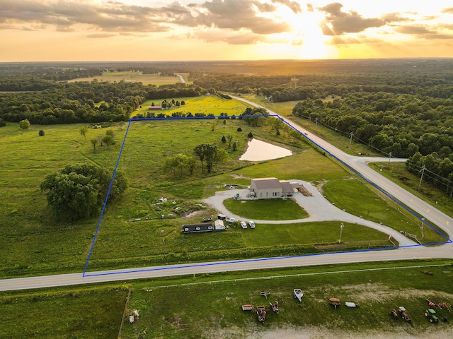30950 E 54th Hwy, El Dorado Springs, MO 64744 - aerial view of sparsely populated area featuring property parcel outlined