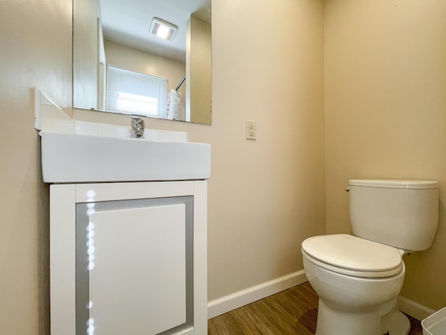 2924 S Roanoke Ave, Springfield, MO 65807 - bathroom with vanity, wood finished floors, and a shower with shower curtain