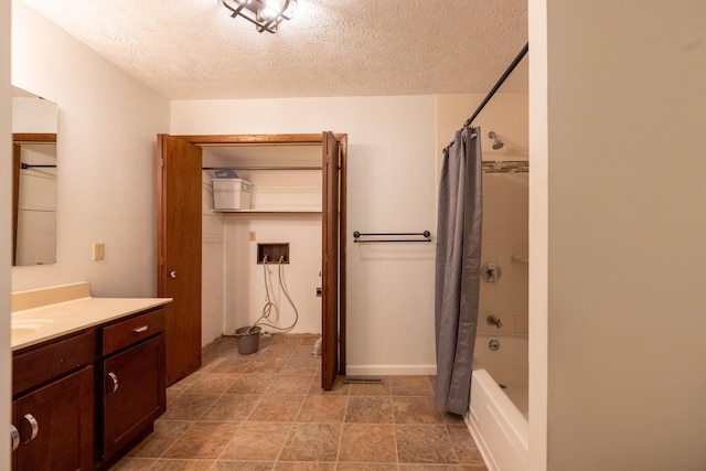 2924 S Roanoke Ave, Springfield, MO 65807 - bathroom with vanity, a textured ceiling, and shower / bathtub combination with curtain
