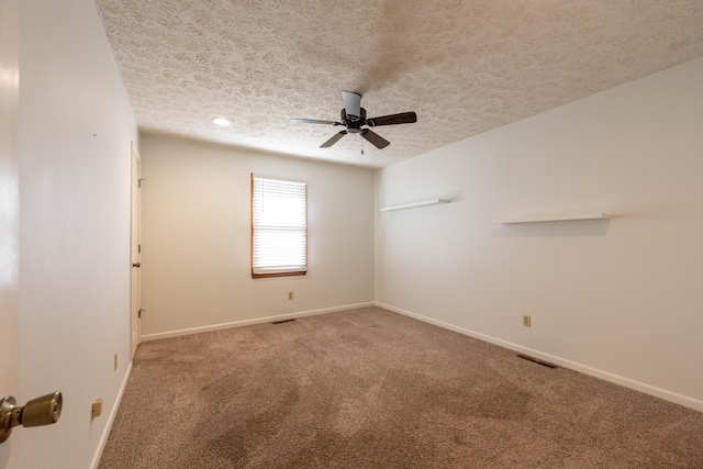 2924 S Roanoke Ave, Springfield, MO 65807 - unfurnished room featuring a ceiling fan, carpet, and a textured ceiling