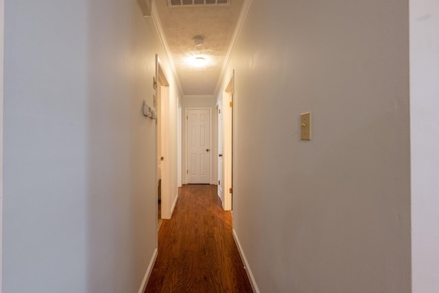 2924 S Roanoke Ave, Springfield, MO 65807 - corridor with dark wood-style floors, ornamental molding, and a textured ceiling