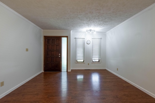 2924 S Roanoke Ave, Springfield, MO 65807 - entrance foyer with a textured ceiling, wood finished floors, and crown molding