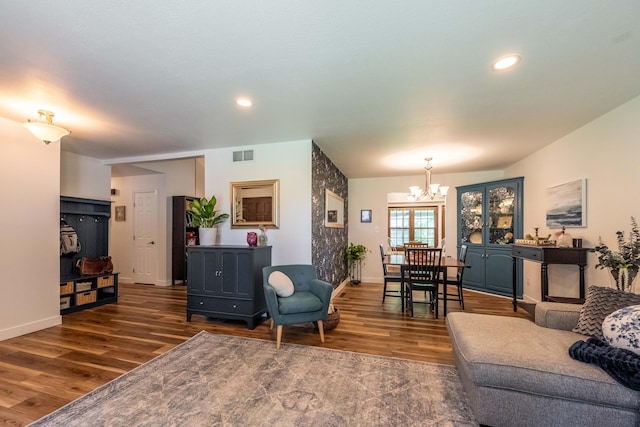 1728 E Camino Alto St, Springfield, MO 65804 - living room with wood finished floors, a chandelier, and recessed lighting