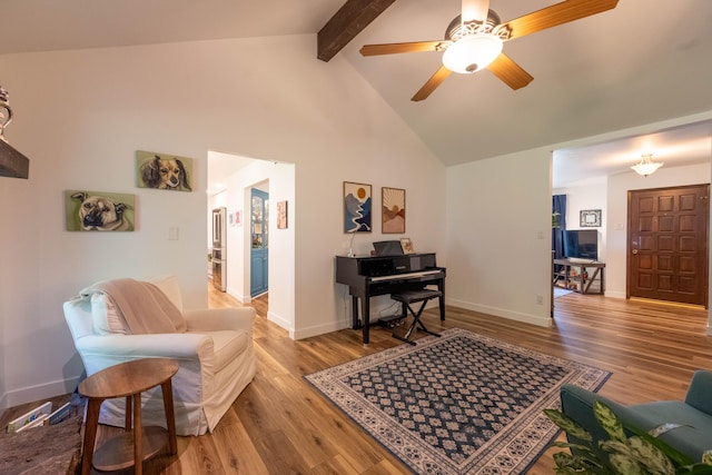 1728 E Camino Alto St, Springfield, MO 65804 - living area with wood finished floors, beamed ceiling, high vaulted ceiling, and ceiling fan