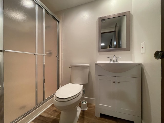1728 E Camino Alto St, Springfield, MO 65804 - full bath featuring wood finished floors, a shower stall, and vanity