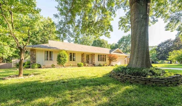 1728 E Camino Alto St, Springfield, MO 65804 - single story home featuring a garage and stone siding