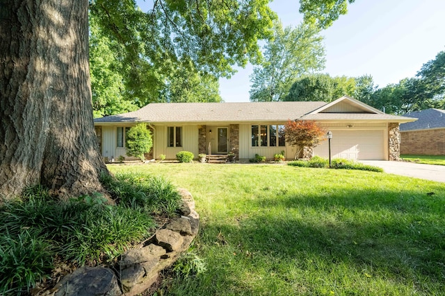 1728 E Camino Alto St, Springfield, MO 65804 - single story home with an attached garage, driveway, a front lawn, stone siding, and a shingled roof