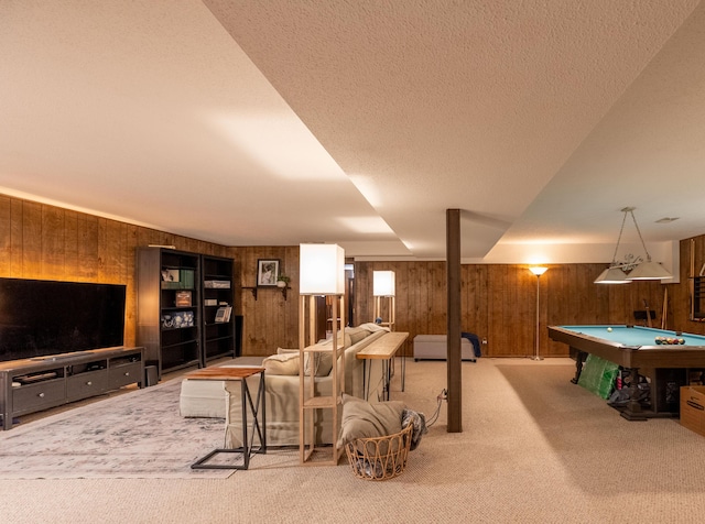 1728 E Camino Alto St, Springfield, MO 65804 - living area with wooden walls, carpet flooring, billiards table, and a textured ceiling