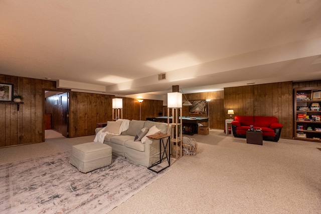 1728 E Camino Alto St, Springfield, MO 65804 - living room featuring wood walls and carpet floors