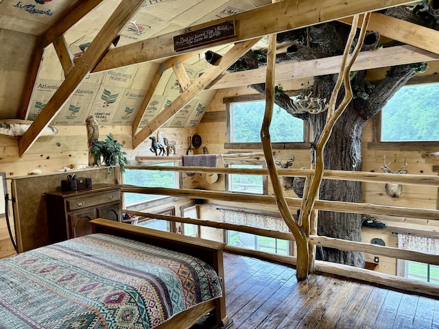 421 N Emory Creek Rd, Walnut Shade, MO 65771 - bedroom featuring wooden walls, hardwood / wood-style flooring, and multiple windows