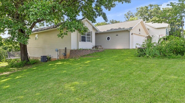 2005 Debra Dr, West Plains, MO 65775 - back of house featuring a lawn