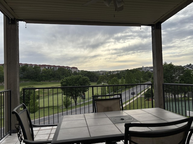 330 S Wildwood Dr Unit B1, Branson, MO 65616 - balcony with ceiling fan and outdoor dining area