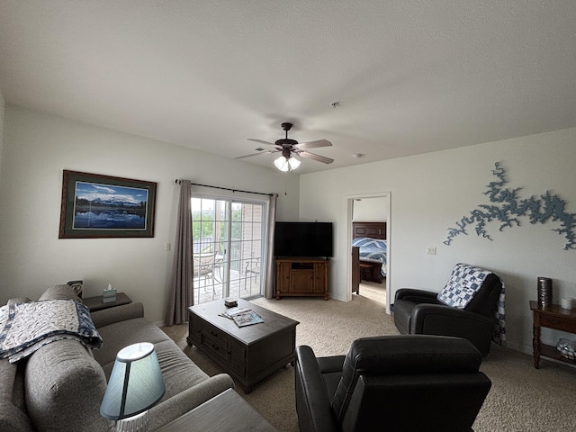 330 S Wildwood Dr Unit B1, Branson, MO 65616 - living room featuring light carpet and a ceiling fan